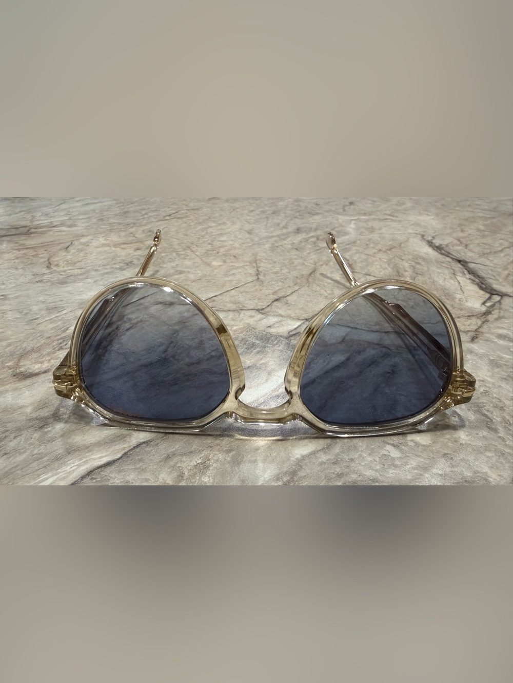 Carrera 314/S Womenβs Clear Frame Sunglasses with Gray-Blue Lenses